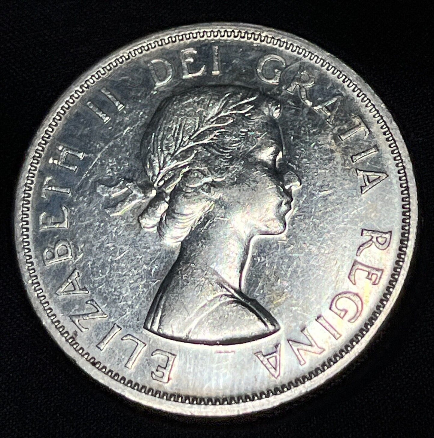 Canada 1957 $1 One Silver Dollar Queen Elizabeth II .800 Silver High Grade #8