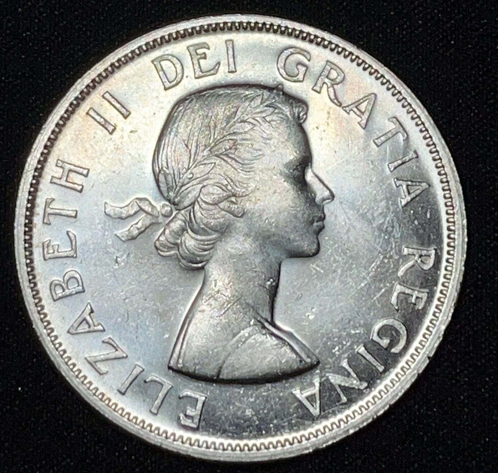 Canada 1957 $1 One Silver Dollar Queen Elizabeth II .800 Silver High Grade #113