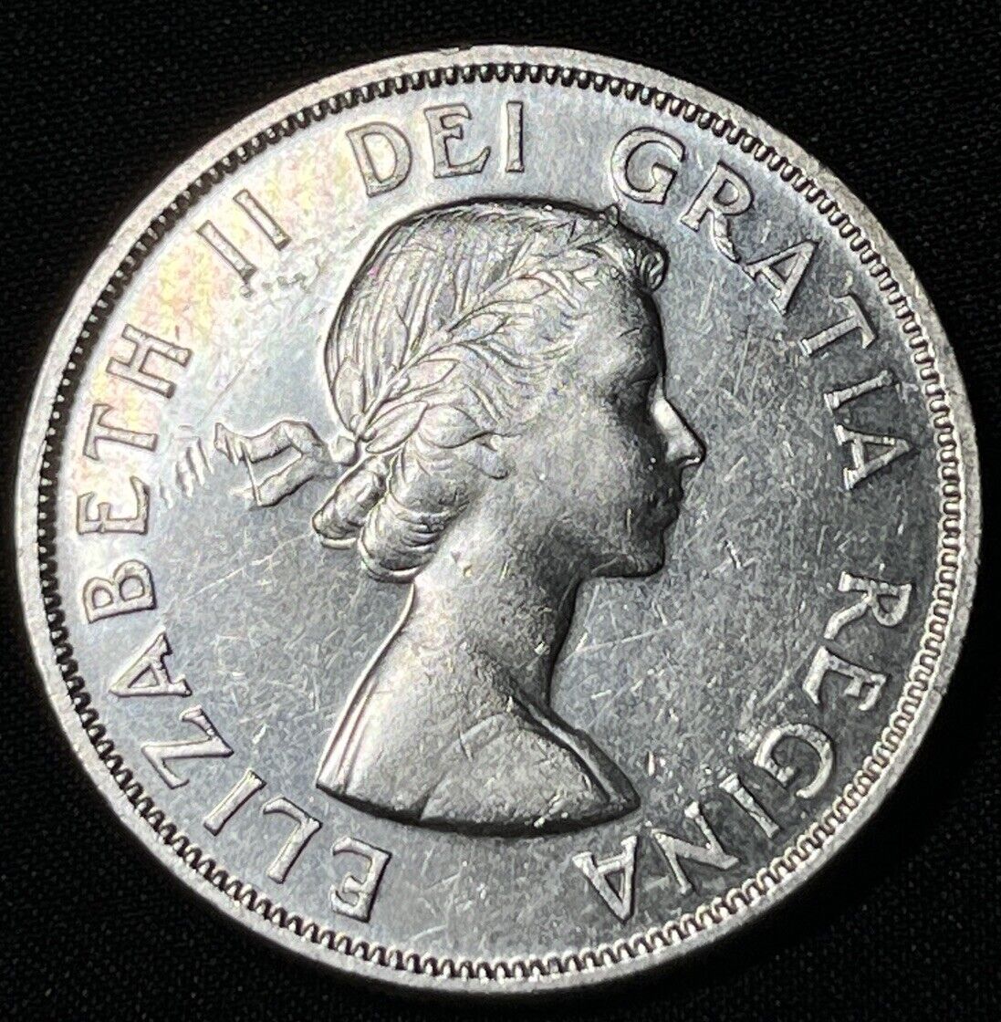 Canada 1957 $1 One Silver Dollar Queen Elizabeth II .800 Silver High Grade #14