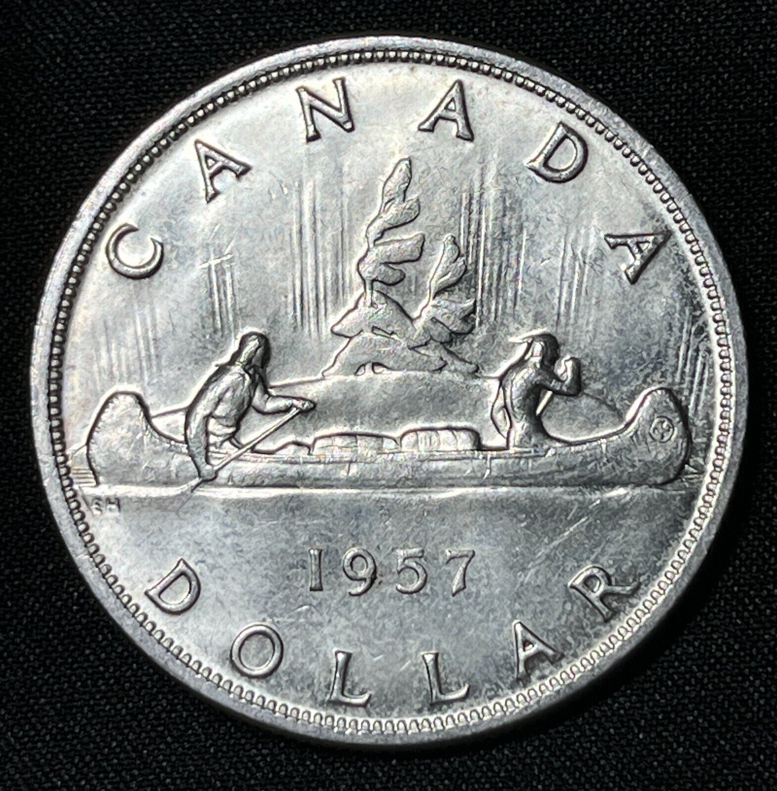 Canada 1957 $1 One Silver Dollar Queen Elizabeth II .800 Silver High Grade #5