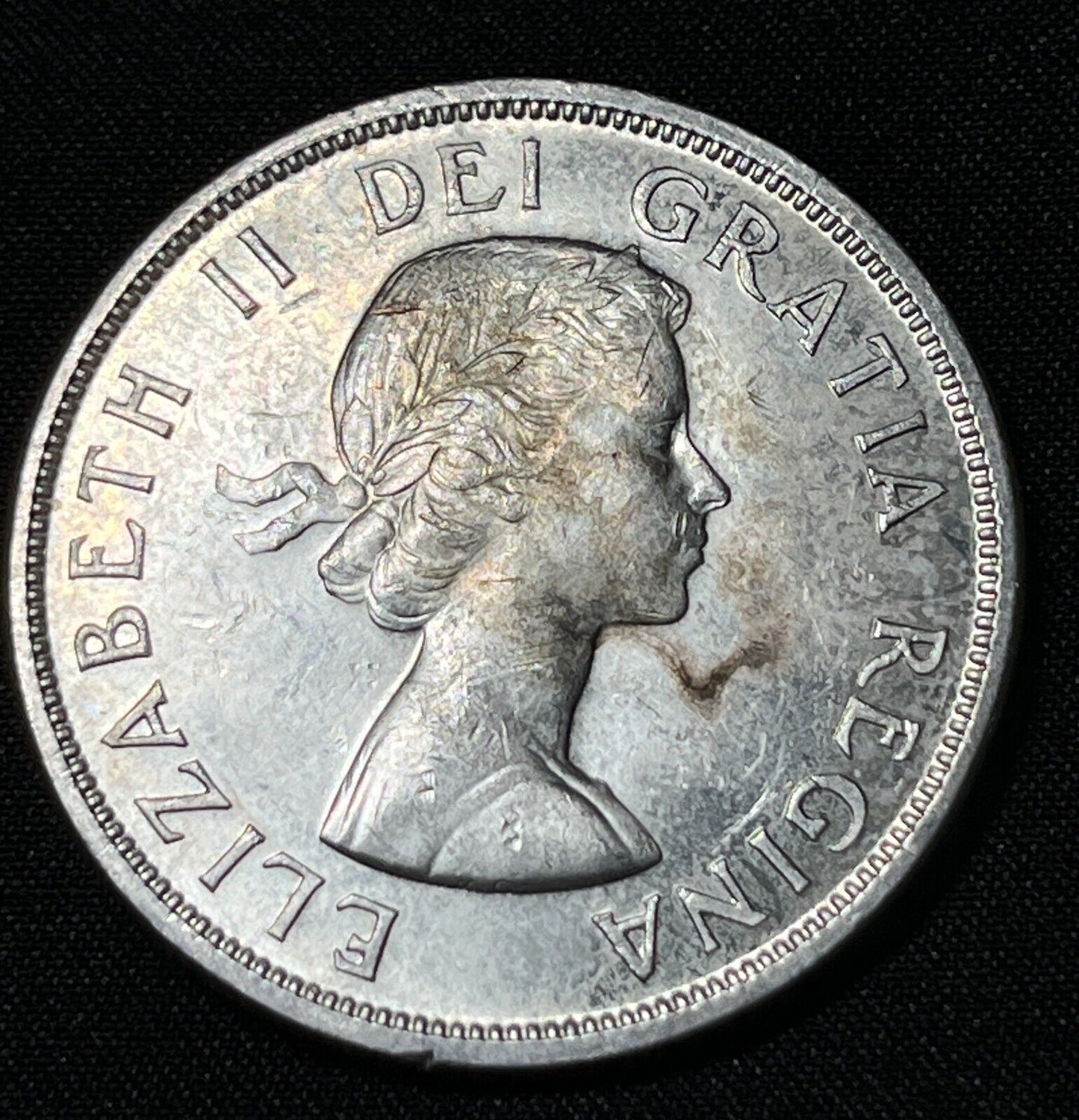 Canada 1957 $1 One Silver Dollar Queen Elizabeth II .800 Silver High Grade #5