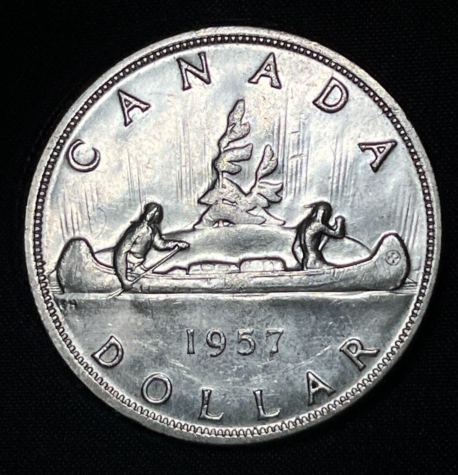 Canada 1957 $1 One Silver Dollar Queen Elizabeth II .800 Silver High Grade #2