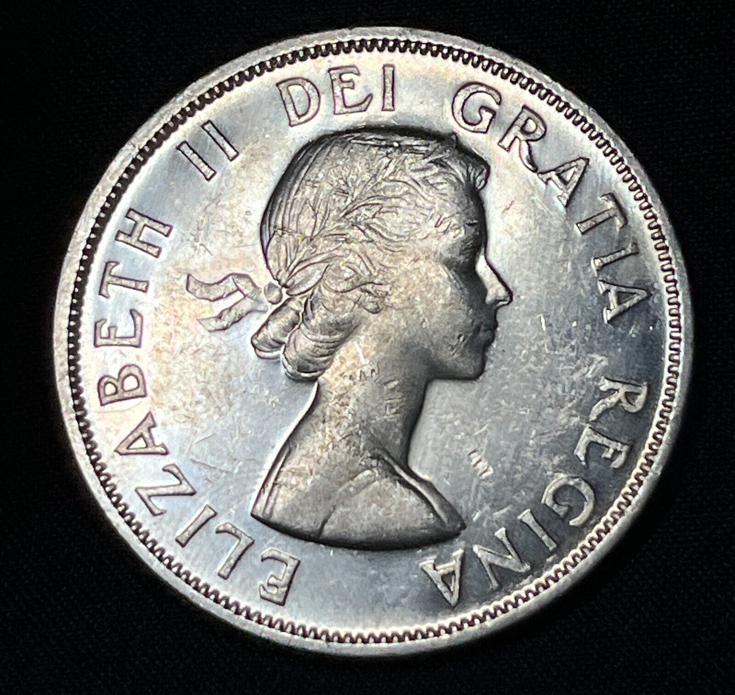 Canada 1957 $1 One Silver Dollar Queen Elizabeth II .800 Silver High Grade #4