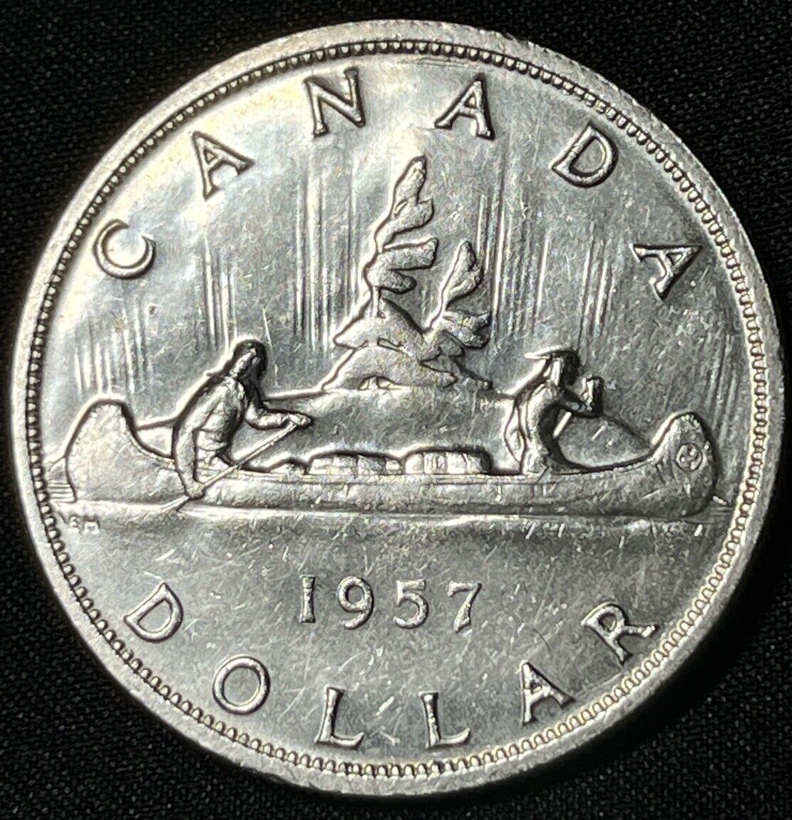 Canada 1957 $1 One Silver Dollar Queen Elizabeth II .800 Silver High Grade #14