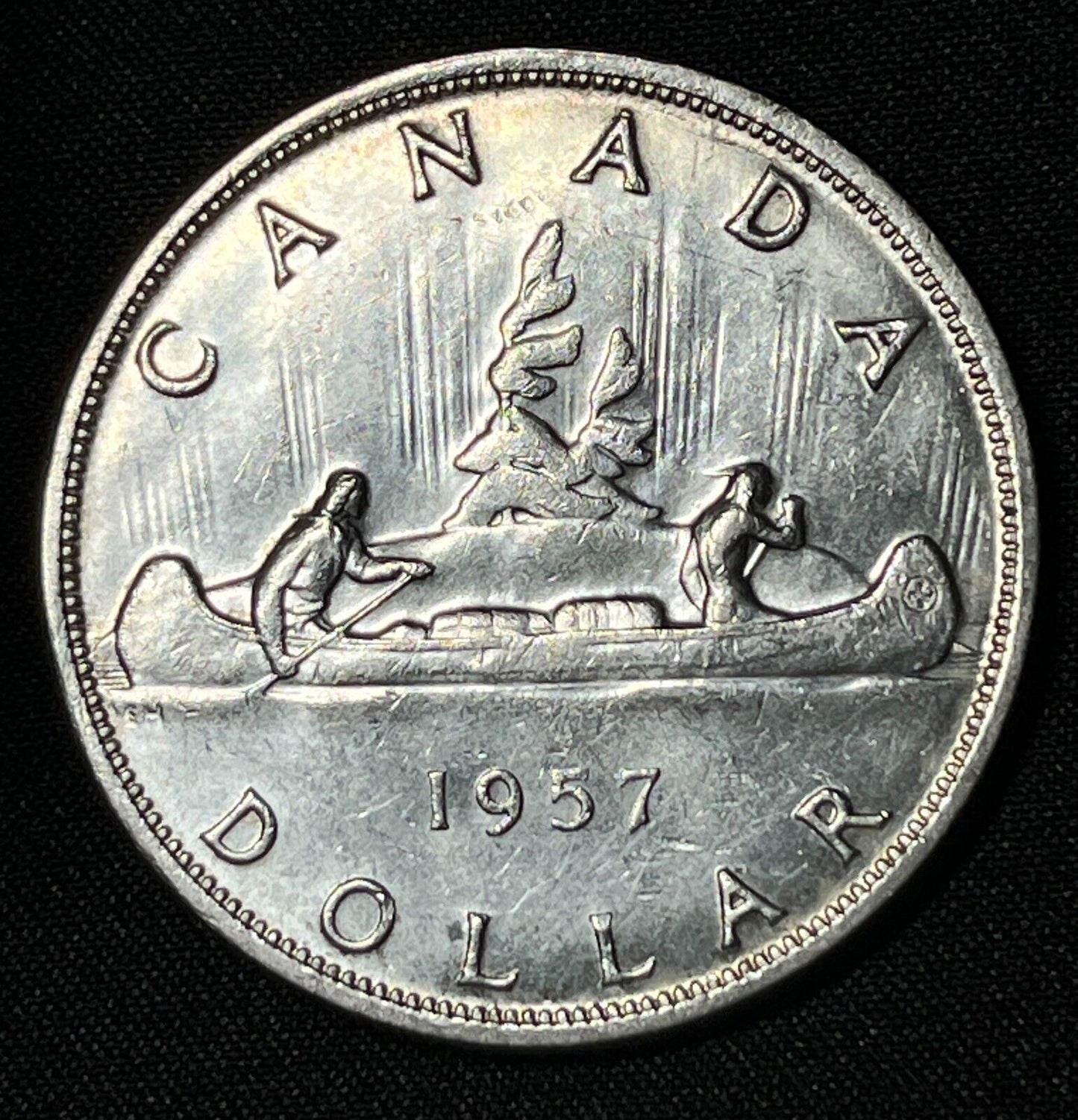 Canada 1957 $1 One Silver Dollar Queen Elizabeth II .800 Silver High Grade #3